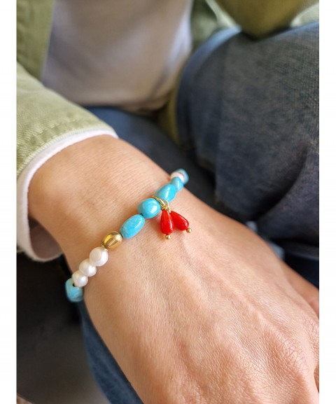 Turquoise bracelet with red...